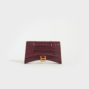 Front view of the BALENCIAGA Hourglass Chain Bag in Burgundy Shiny Crocodile Embossed Calfskin