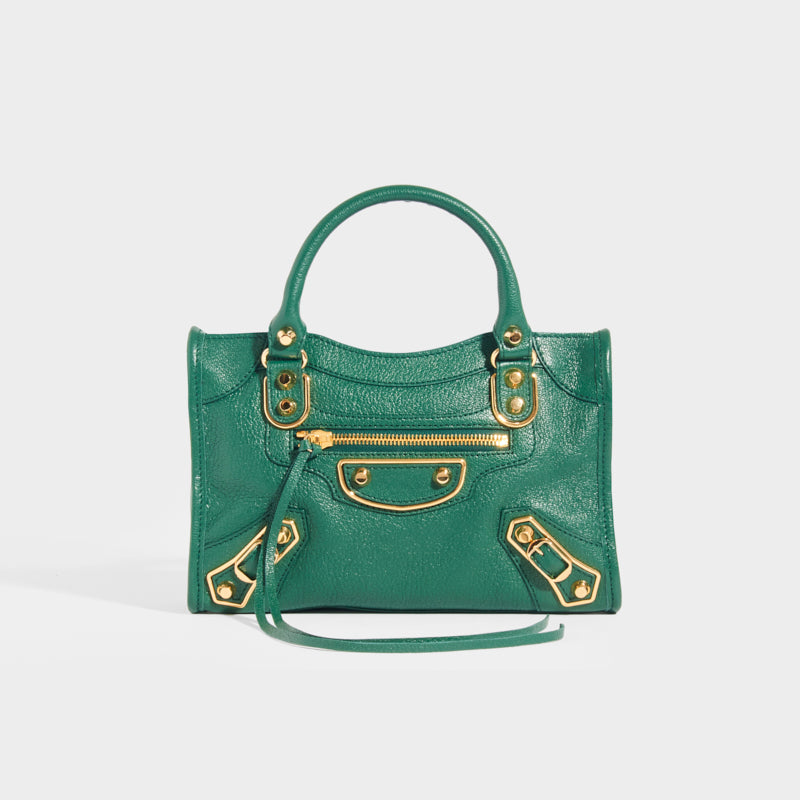 BALENCIAGA Mini City Bag With Gold Hardware in Forest Green Leather with top handles and leather cross body strap
