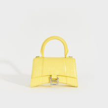 Load image into Gallery viewer, Front view of the BALENCIAGA XS Hourglass Top Handle Bag in Light Yellow Embossed Croc