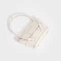 Top down view of the BOTTEGA VENETA Arco Small Intrecciato Leather Tote Bag in White