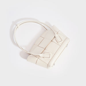 Top down view of the BOTTEGA VENETA Arco Small Intrecciato Leather Tote Bag in White