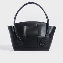 Load image into Gallery viewer, Back of the BOTTEGA VENETA Arco Large Intreccio Leather Tote Bag in Black