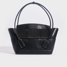 Load image into Gallery viewer, Front view of the BOTTEGA VENETA Arco Large Intreccio Leather Tote Bag in Black