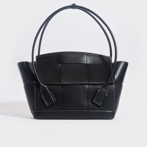 Front view of the BOTTEGA VENETA Arco Large Intreccio Leather Tote Bag in Black