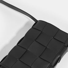 Load image into Gallery viewer, Top of BOTTEGA VENETA Cassette Maxi Intrecciato Bag in Black Leather