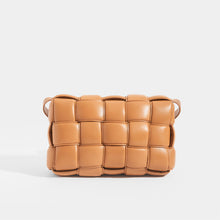 Load image into Gallery viewer, Rear View of BOTTEGA VENETA Padded Cassette Crossbody Bag in Caramel Lambskin Leather