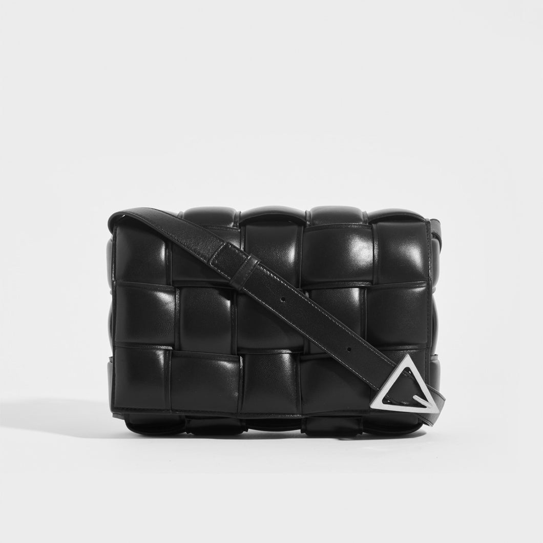 Front view of the BOTTEGA VENETA Padded Cassette Bag in Black (Nero) with Silver Hardware