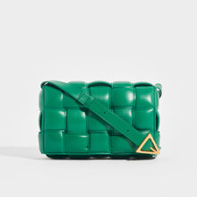 Load image into Gallery viewer, Front view of the BOTTEGA VENETA Padded Cassette Bag in Racing Green