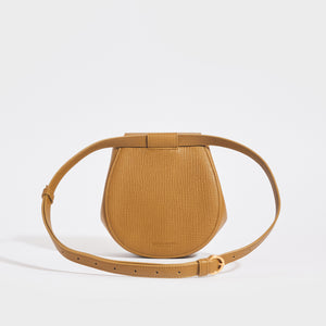 BOTTEGA VENETA Palmellato Rounded Leather Belt Bag in Mustard