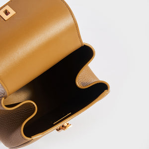 BOTTEGA VENETA Palmellato Rounded Leather Belt Bag in Mustard
