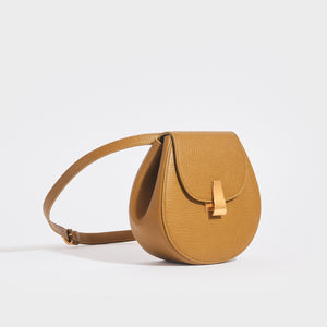 BOTTEGA VENETA Palmellato Rounded Leather Belt Bag in Mustard