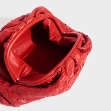 Load image into Gallery viewer, Inside of the BOTTEGA VENETA The Pouch Intrecciato Leather Clutch in Red
