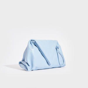 Side view of the BOTTEGA VENETA The Trine Leather Clutch in Ice