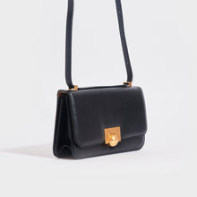 Load image into Gallery viewer, Side view of the BOTTEGA VENETA The Classic Small Leather Shoulder Bag in Black