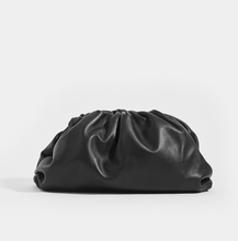 Load image into Gallery viewer, Rear of the BOTTEGA VENETA The Pouch Leather Clutch in Black 