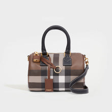 Load image into Gallery viewer, Front view of the BURBERRY Check and Leather Mini Bowling Bag in Dark Birch Brown