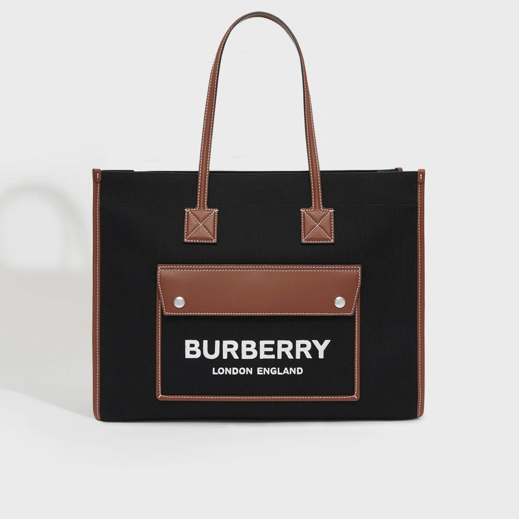 BURBERRY Medium Canvas and Leather Two Tone Freya Tote in Black and Tan