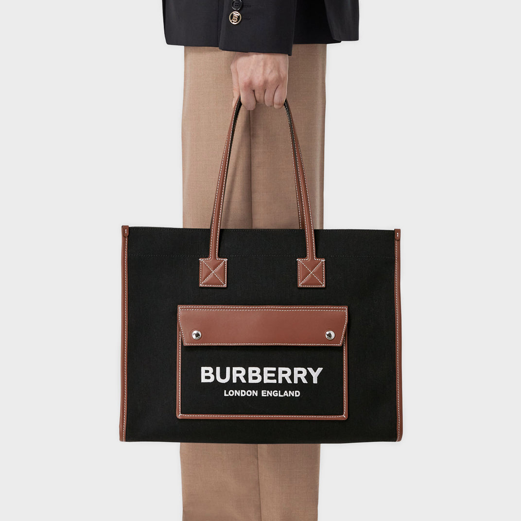BURBERRY Medium Canvas and Leather Two Tone Freya Tote in Black and Tan