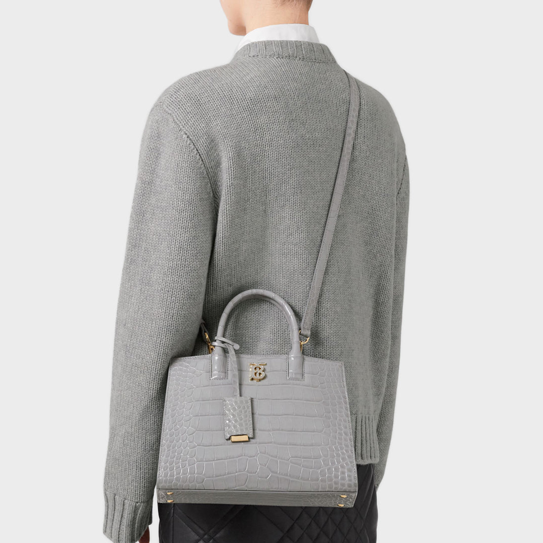 Model wearing the BURBERRY Mini Frances Bag in Cloud Grey Embossed Leather