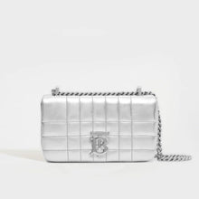 Load image into Gallery viewer, Front view of the BURBERRY Mini Quilted Leather Lola Bag in Metallic Silver