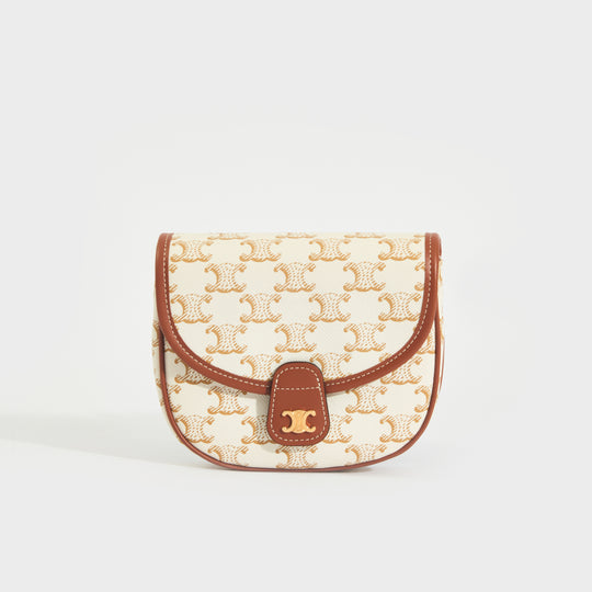 Front of the CELINE Triomphe Buzas Canvas Crossbody Bag in White & Tan