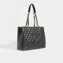Load image into Gallery viewer, CHANEL Vintage Shopping Tote in Black Caviar Leather with Silver Hardware - Side View