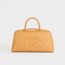 Load image into Gallery viewer, Front of the CHANEL CC Quilted Caviar Bowling Bag in Beige 2003 - 2004