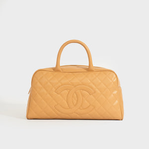 Front of the CHANEL CC Quilted Caviar Bowling Bag in Beige 2003 - 2004