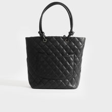 Load image into Gallery viewer, Back view of Chanel cambon ligne diamond quilted tote bag in black leather from 2003-2004