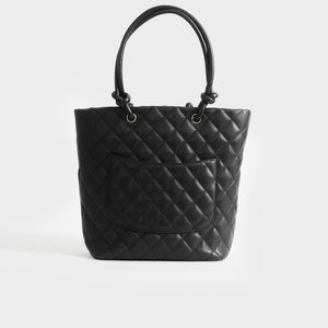 Back view of Chanel cambon ligne diamond quilted tote bag in black leather from 2003-2004