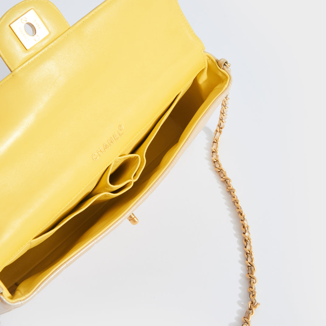 CHANEL Vintage East West Chocolate Bar Shoulder Bag in Champagne Gold –  COCOON