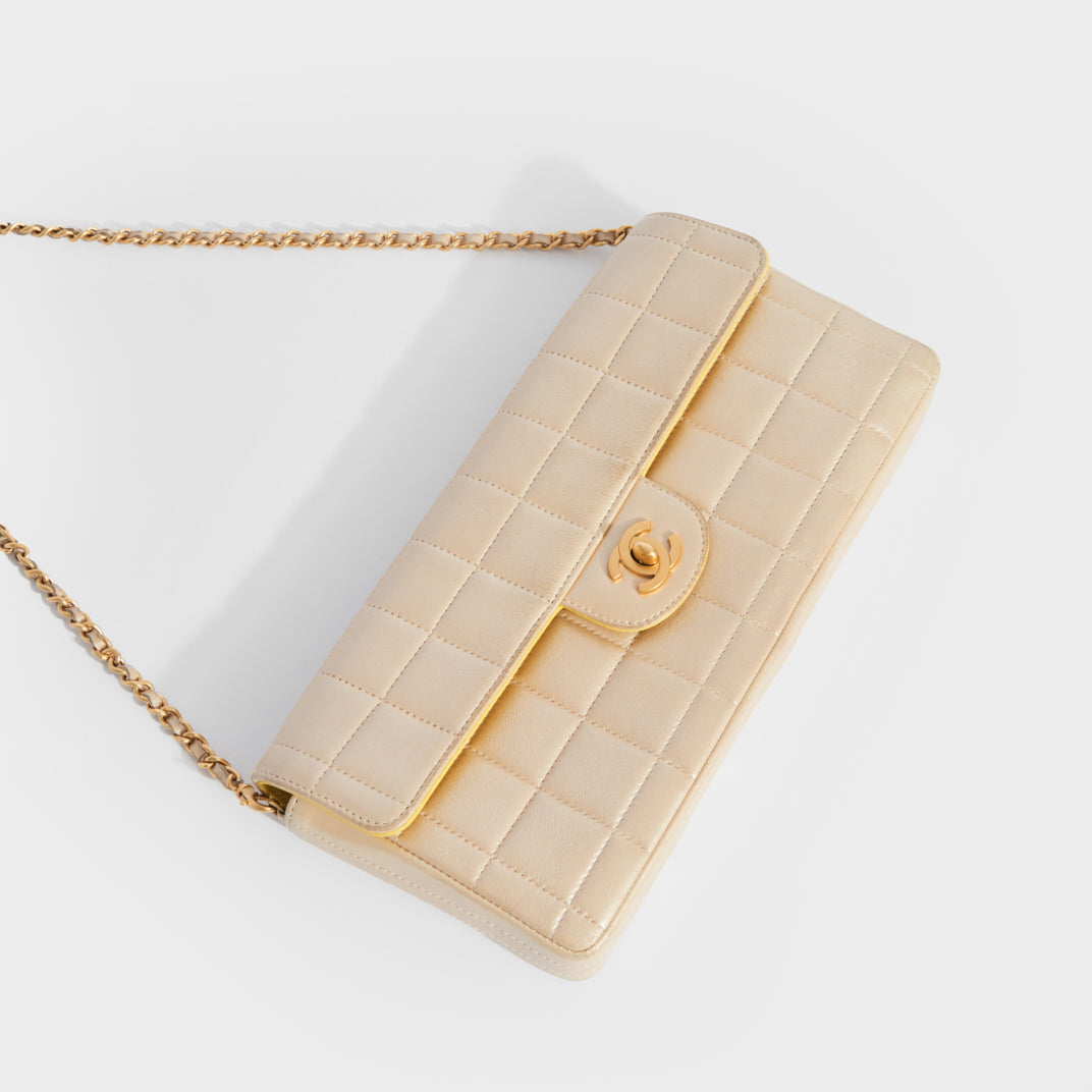 CHANEL Vintage East West Chocolate Bar Shoulder Bag in Champagne Gold –  COCOON