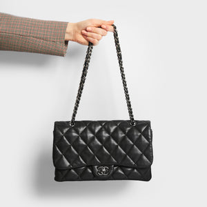 Model shot of the CHANEL Large Single Flap Double Chain Bag in Black Lambskin 2011 - 2012