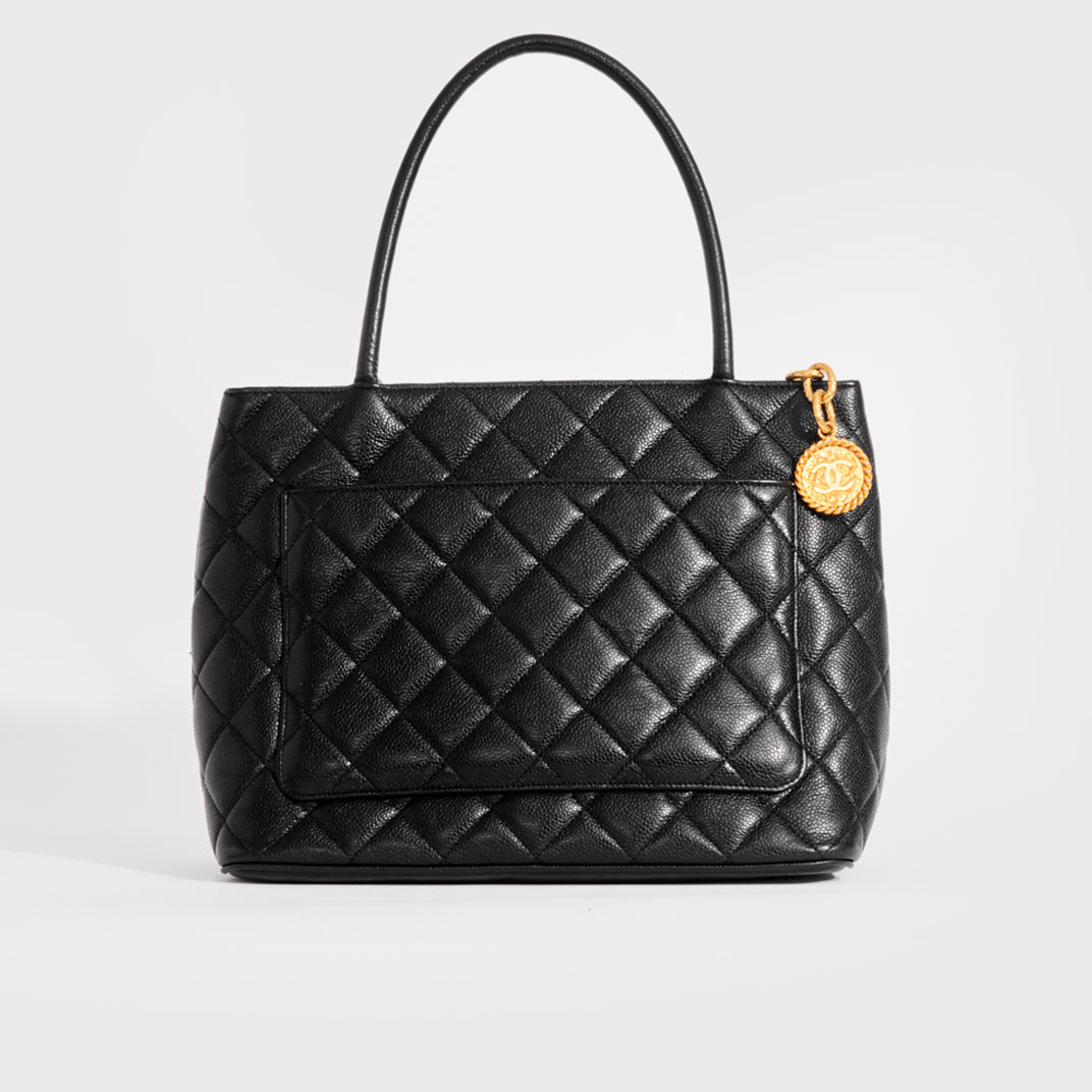 chanel black leather handbag used