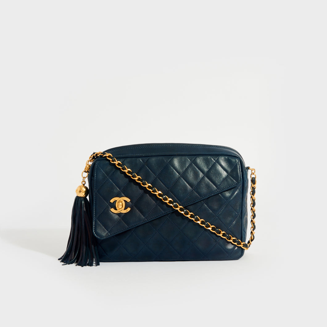 Front view of the CHANEL Vintage CC Diamond Quilted Tassel Crossbody Bag in Navy 1991 - 1994