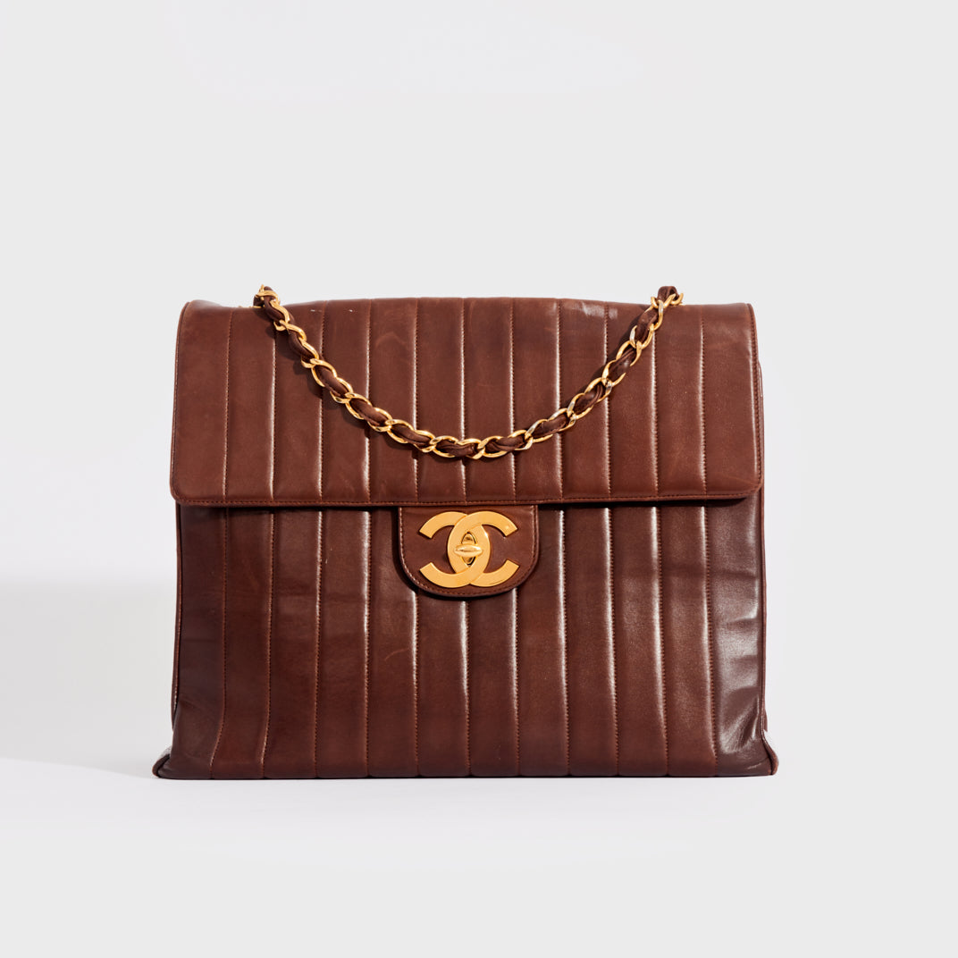 Front view of the CHANEL Vertical Quilted Jumbo Flap Bag in Chocolate Brown Lambskin 1994