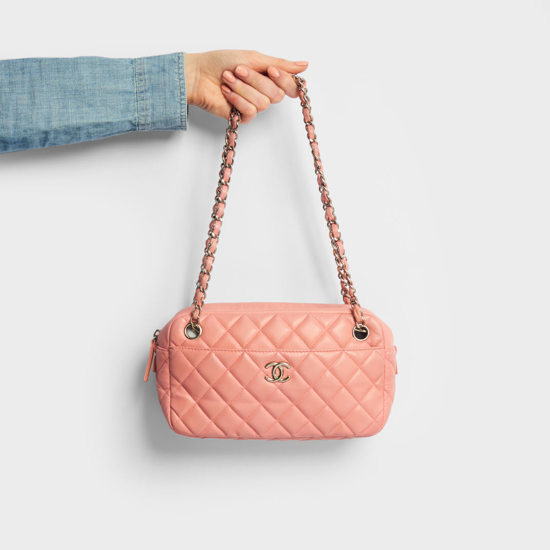Model holding the CHANEL Quilted Shoulder Bag in Pink Lambskin 2008-2009