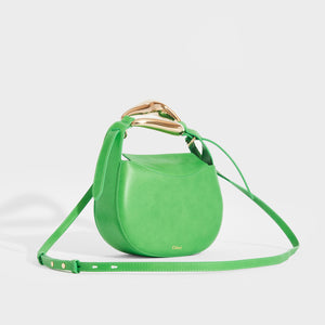 Side view of the CHLOÉ Kiss Small Leather Tote in Green