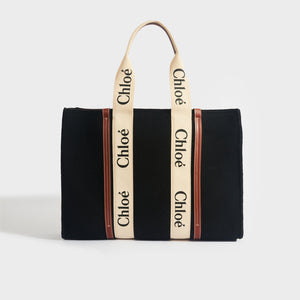 Front view of Chloe woody large tote in black with tan leather in felt