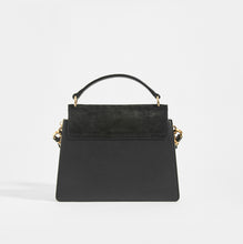 Load image into Gallery viewer, Rear view of CHLOÉ Small Faye Tote in Black Leather with leather top handle and suede trim