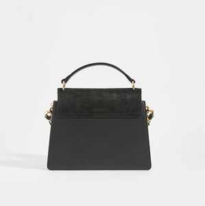 Rear view of CHLOÉ Small Faye Tote in Black Leather with leather top handle and suede trim
