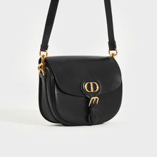 Load image into Gallery viewer, Side view of the CHRISTIAN DIOR Medium Bobby Bag in Black Leather