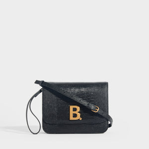 BALENCIAGA B Small Textured Leather Cross-body Bag in Black with Gold B logo