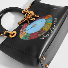 Load image into Gallery viewer, Top down detail of DIOR Vintage Lady Dior Wheel of Fortune Bag in Black leather 