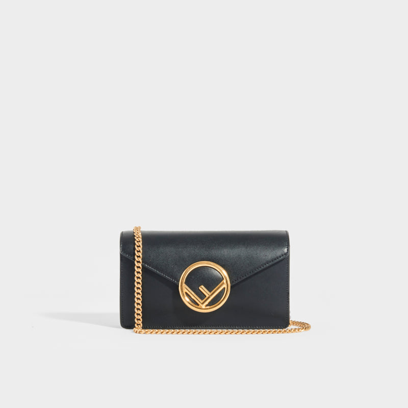 FENDI Belt Bag with Gold Logo Hardware in black leather and gold shoulder chain strap