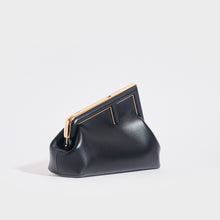 Load image into Gallery viewer, Side view of the FENDI First Small Bag in Black