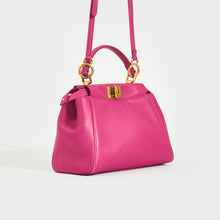 Load image into Gallery viewer, Side view of the FENDI Mini Peekaboo Handbag in Pink
