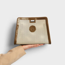 Load image into Gallery viewer, Model  holding the FENDI Peek-A-Boo Defender Leather in White and Brown