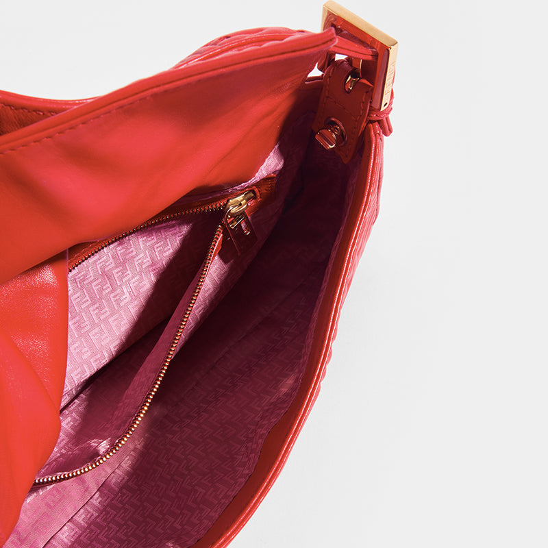 Inside view of the FENDI Vintage Red Leather Baguette Bag with zipped inside pocket 