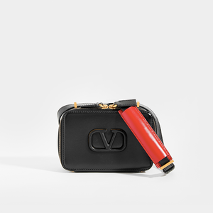 VALENTINO VSLING Small Leather Camera Bag with black shoulder strap and red strap detail